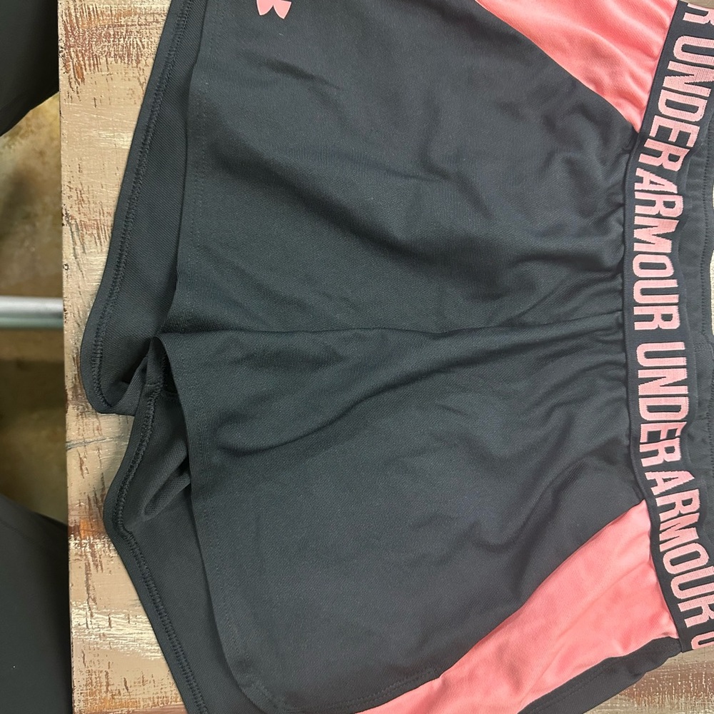 Two pairs of under armour shorts size L